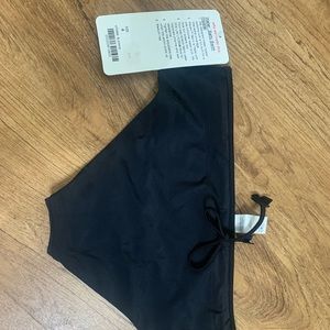 Blk lulu lemon swim bottoms . Two ways to wear . Blk,or blk and white striped .